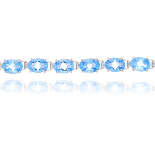 9ct White Gold Blue Topaz Tennis Bracelet