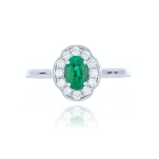 18ct White Gold 0.52ct Oval Cut Emerald And Diamond Cluster Ring